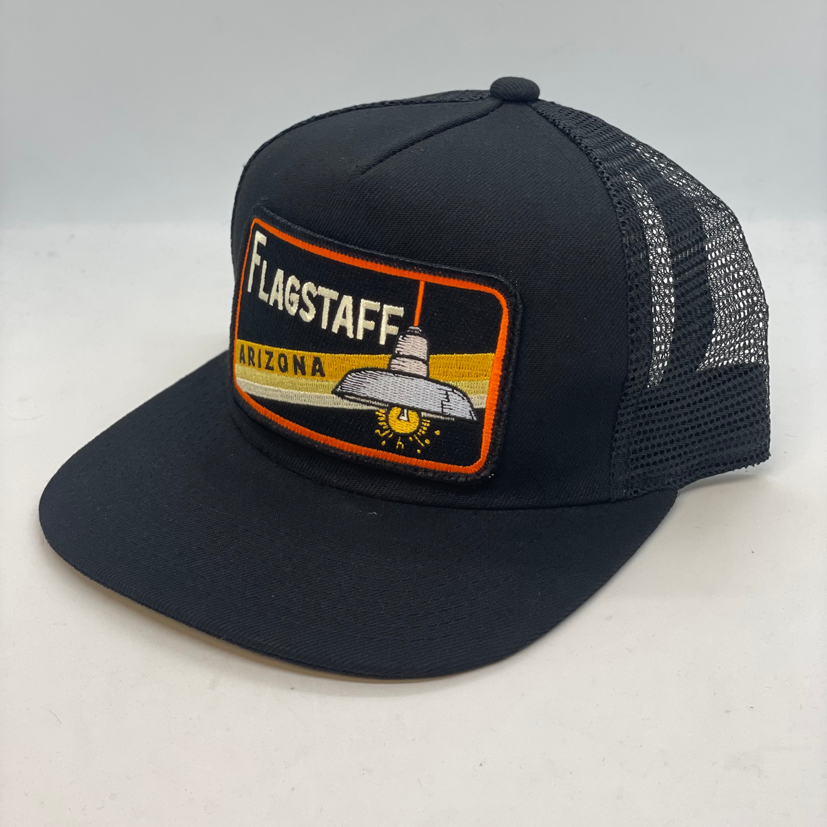 Santas Got A Brand New Ride! by Retro Boater District Trucker Hat with Snapback