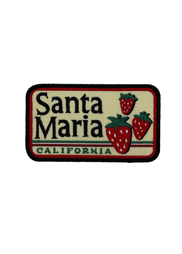 An embroidered rectangular patch featuring the text 'Santa Maria CALIFORNIA' with three red strawberries on a cream background, outlined in black and red.